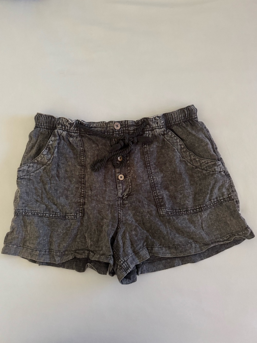 Free People size large shorts. EUC. Faded black. Elastic waist w/drawstring.